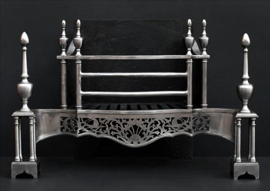 A mid Georgian Chippendale style steel firegrate