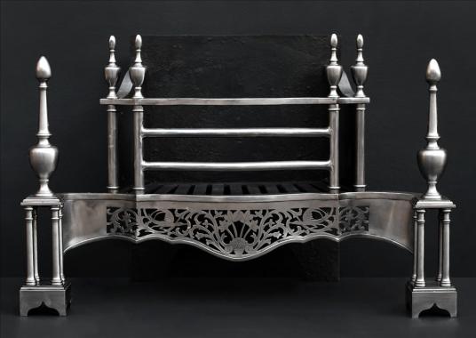 A mid Georgian Chippendale style steel firegrate