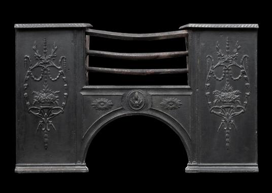 A 19th century English cast iron hob grate