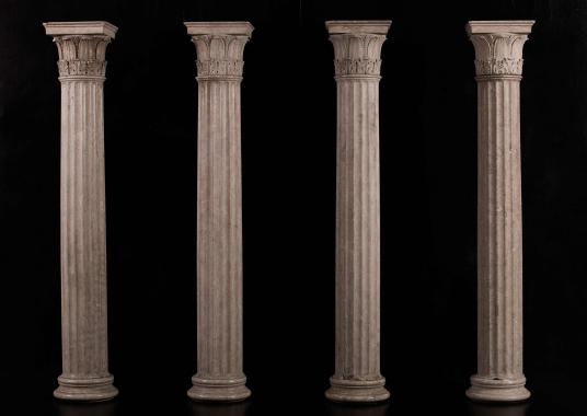 A collection of four neo-classical columns in Istrian stone