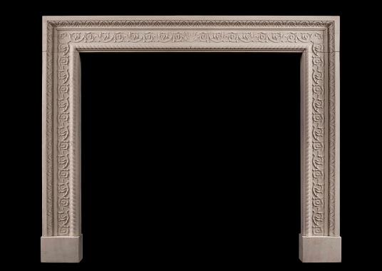 A carved English stone Fireplace with scrolled detailing