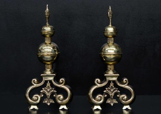 A substantial pair of English brass firedogs