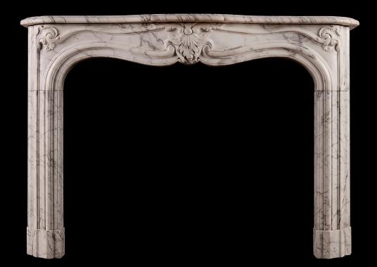 A French marble fireplace in the Rococo manner