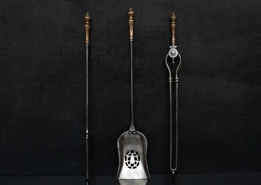 A set of brass and steel firetools 29.8 inch
