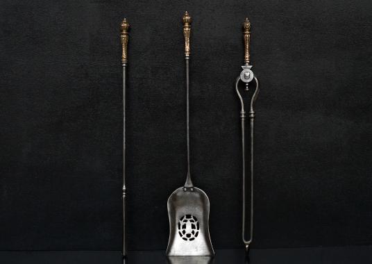 A set of brass and steel firetools 29.8 inch