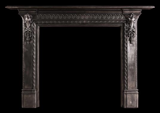 A mid 19th century English cast iron fireplace.