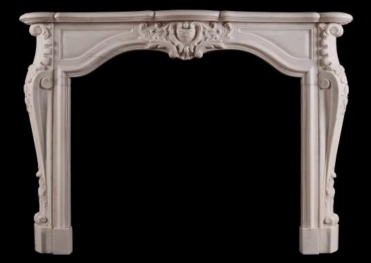 A French transitional Louis XIV/XV marble fireplace