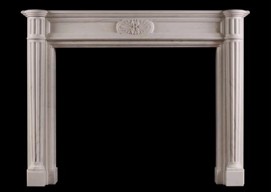 A French Louis XVI style white marble fireplace