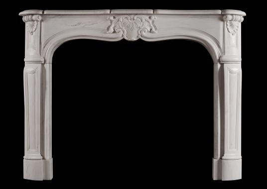 A French Louis XV style white marble fireplace