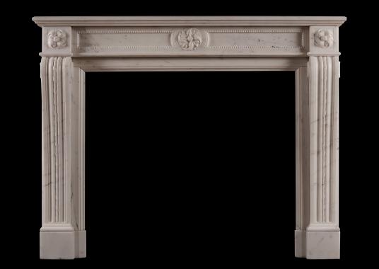 A Statuary marble antique fireplace in the Louis XVI manner