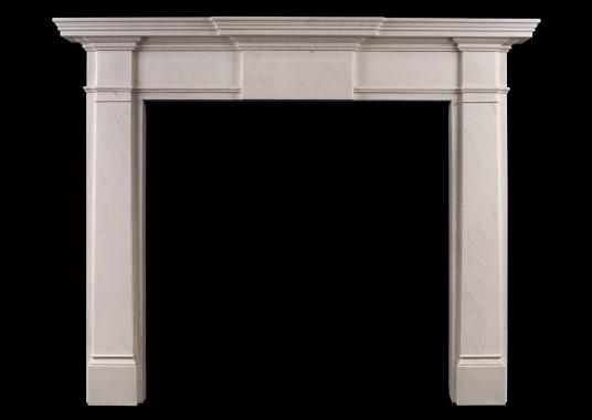 An elegant English fireplace in white marble