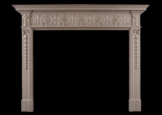 An English wood fireplace in the George III style