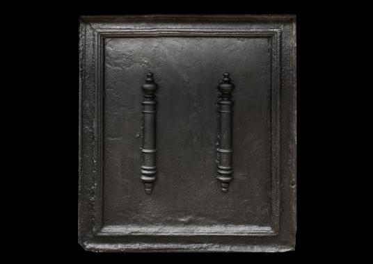 A substantial cast iron fireback