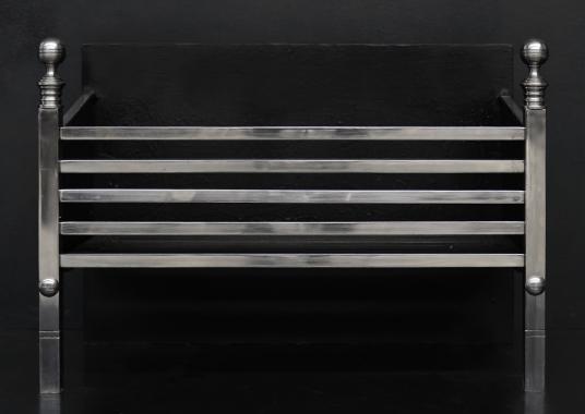 A simple polished steel firegrate