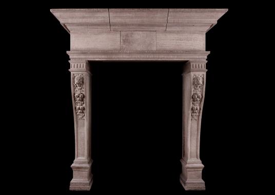 A rustic French limestone fireplace