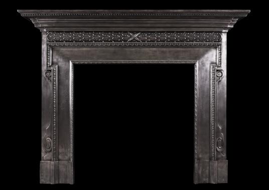 A polished cast iron fireplace in the mid Georgian style