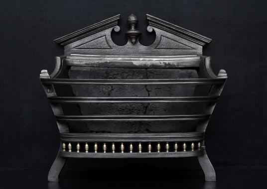A Regency style cast iron firebasket