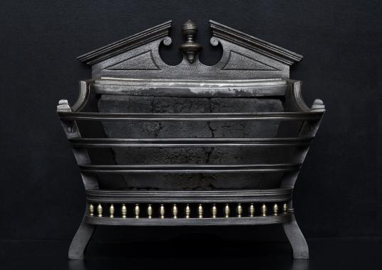 A Regency style cast iron firebasket