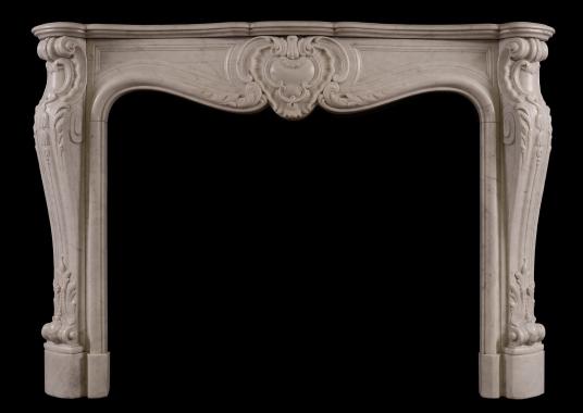 A French marble fireplace in the Louis XV style