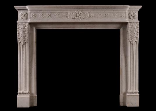 A French Louis XVI style marble fireplace in Carrara marble