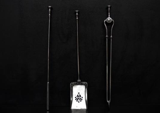 A set of steel firetools