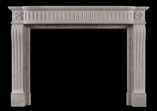 A French Louis XVI style fireplace in Italian Carrara