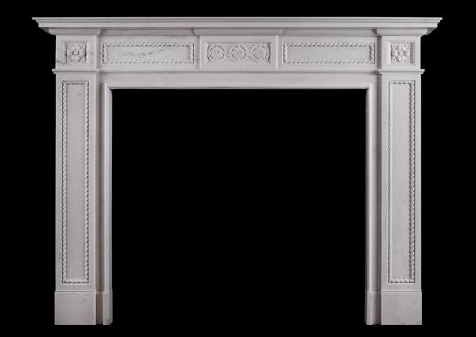 An attractive English fireplace in the Regency style
