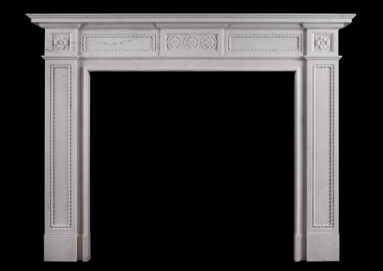 An attractive English fireplace in the Regency style