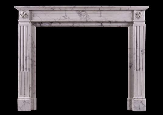A veined Statuary Louis XVI style marble fireplace