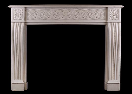A carved Italian Statuary marble fireplace