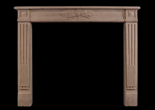 A Louis XVI style French limestone antique fireplace