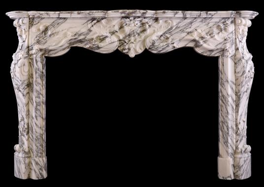 A Louis XV style fireplace in Italian Arabescato marble