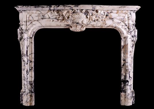A Breccia Louis XIV/XV transitional fireplace