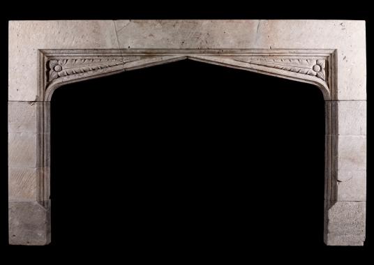 A substantial Gothic stone fireplace