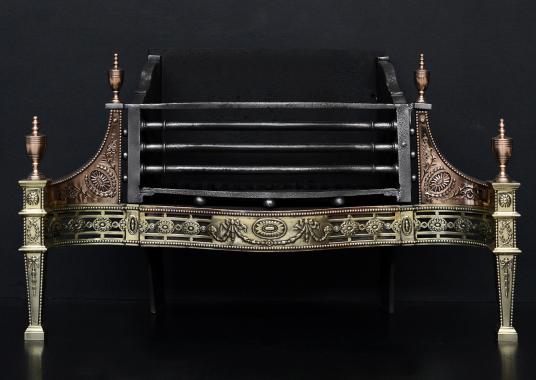 A brass and gunmetal firebasket