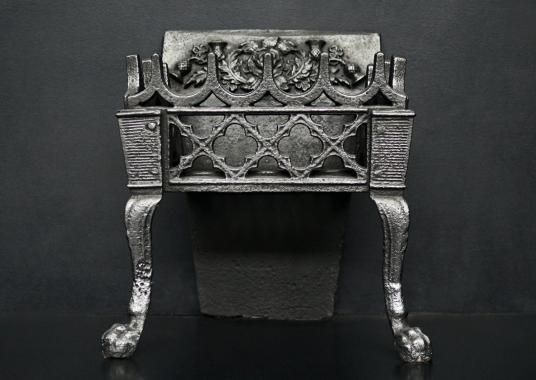 A Neo-Gothic style firegrate