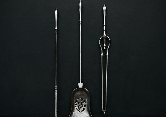 A set of steel firetools