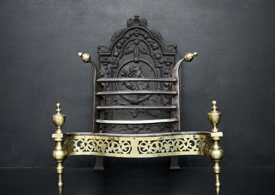 A brass and steel firegrate