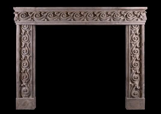 An impressive carved stone Italian fireplace