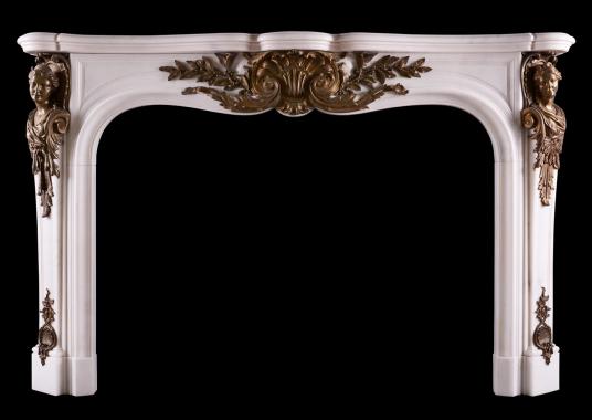 A Statuary marble fireplace with bronze ormolu