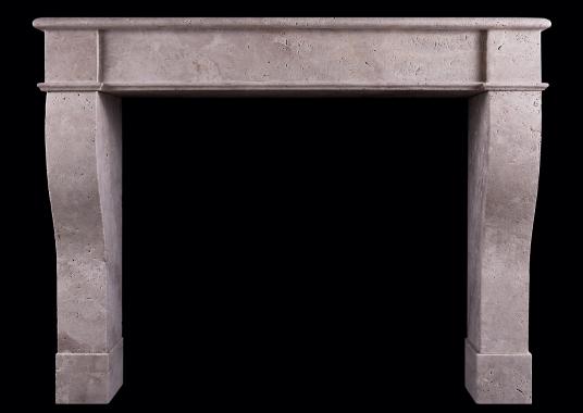 A rustic French fireplace in Travertine stone