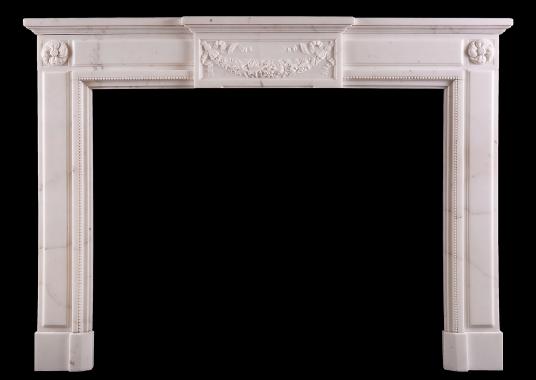 A Statuary marble Louis XVI style fireplace