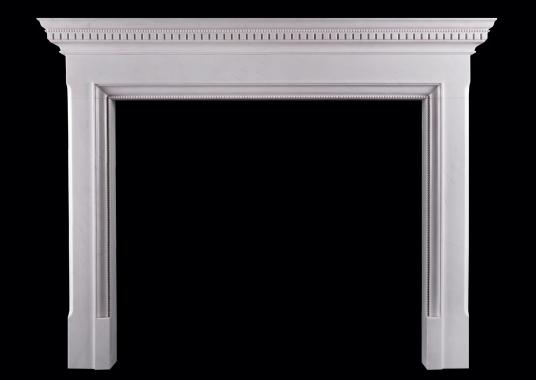 A Georgian style white marble fireplace