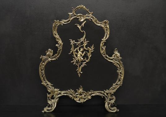 A French Louis XV style brass firescreen