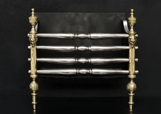 A Regency style brass and steel firegrate