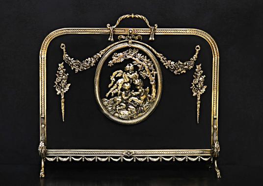 An ornate French Rococo brass firescreen