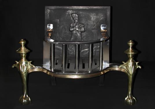 A 19th century Dutch brass and steel firegrate