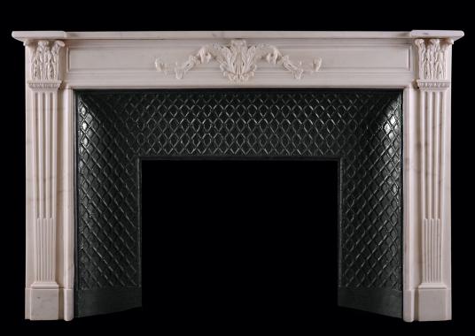 A Statuary marble fireplace in the Louis XVI style