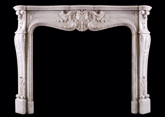 A 19th century French marble fireplace in the Louis XV style