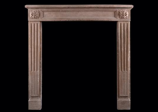 A petite Louis XVI style fireplace